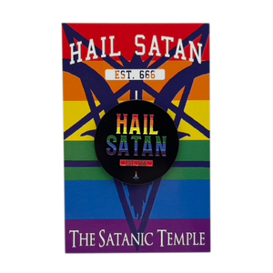 A circular black enamel pin featuring the text 'HAIL SATAN' in rainbow colors and 'EST. 666' in white, displayed on its original backing card which has a rainbow-striped background and the text 'HAIL SATAN' and 'THE SATANIC TEMPLE'.