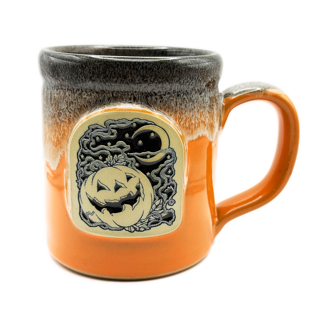 The Satanic Temple Jack O' Lantern Moon mug, sunset orange glaze" / "Jack o' lantern moon face medallion on orange Deneen mug.